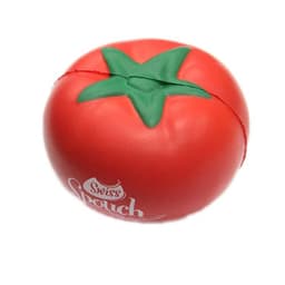 A red tomato-shaped stress reliever with a green stem and a logo on one side.