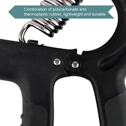 A close-up of a black adjustable hand grip made from polycarbonate and thermoplastic rubber with a spring mechanism.