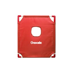 A red portable cornhole game board featuring a central hole and a logo.
