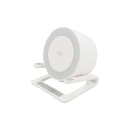 A white night light speaker with a wireless charging base, featuring a sleek design and subtle branding.
