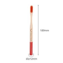 A large round-handle bamboo toothbrush with a red bristle portion and a natural bamboo body, featuring a logo.