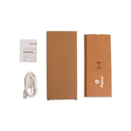 A cork wireless charger in a foldable design, accompanied by a user manual and a charging cable. It has a simple, natural appearance.