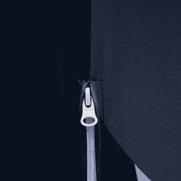 A close-up of a zip on a dark fabric, featuring a silver pull tab against a contrasting background.