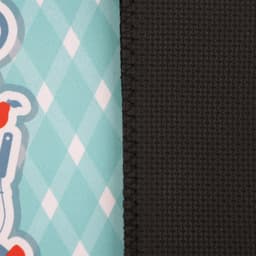 A neoprene oven mitt featuring a patterned fabric in turquoise and white, with a solid black textured side.