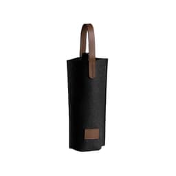 A drink bottle in a black felt wine bag with a brown leather handle and accent.