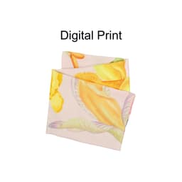 A twill weave square scarf featuring a pastel pink background with a vibrant floral digital print in yellow and orange hues.