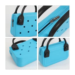 A mini handbag in bright blue with black handles, featuring holes for ventilation and a zip closure.