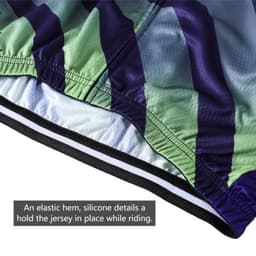 A close-up of a green and purple men's cycling vest featuring an elastic hem and silicone details for better grip.