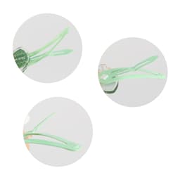 A green hair clip featuring a colourful design, shown in three circular close-up views. It has a logo visible.