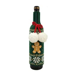 A drink bottle with a green knitted sleeve featuring a gingerbread man, white snowflakes, and pom-pom decorations.