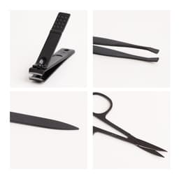 A portable manicure set featuring black nail clippers, tweezers, a nail file, and scissors, all compactly arranged.