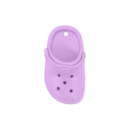 A purple clog shoe fridge magnet with holes and a strap, featuring a simple design and smooth surface.