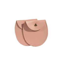 A pair of oval-shaped PU leather jewellery pouches in soft pink, featuring a snap closure.