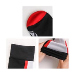 Knee high socks in black with red and white accents, featuring a branded logo. Close-up of toe and cuff details.