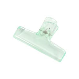 A translucent green plastic clip with a spring mechanism for securing items together.