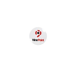 A round, white sticker featuring a red and black logo and the word "NinePoint" in black and red.