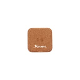 A square cork wireless charger featuring a simple design and a logo.