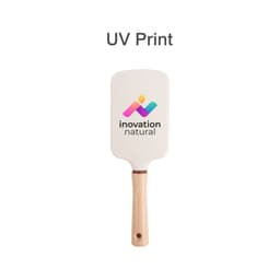 A paddle brush with a white head and a wooden handle, featuring a logo on the surface.