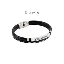 A black leather bracelet featuring a silver engraving plate and a clasp, with a decorative woven design.