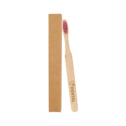 A bamboo toothbrush with a large flat handle and pink bristles, packaged in a brown cardboard box.
