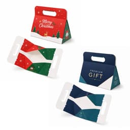 Foldable gift boxes in green, red, and navy blue with various holiday designs and a logo.