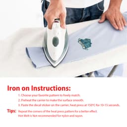 An iron is being used to apply a custom woven patch on light blue fabric. The patch features a logo.