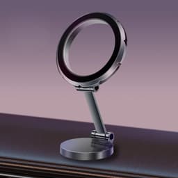 A sleek black and silver magnetic car phone holder with an adjustable arm and circular mount.