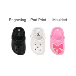 Three Clog Shoe fridge magnets in black, white, and pink with a decorative bow. Each has a branding logo.