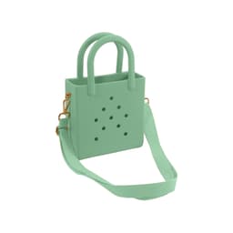 A mint green mini beach bag with perforations, featuring two handles and an adjustable strap. It has a logo.