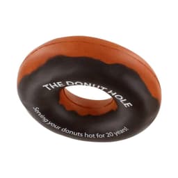 A donut-shaped stress reliever in brown and orange, featuring a circular hole in the centre and a logo.