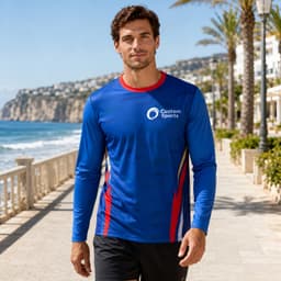 A long-sleeved t-shirt in blue with red accents, featuring a logo, designed for sun protection.