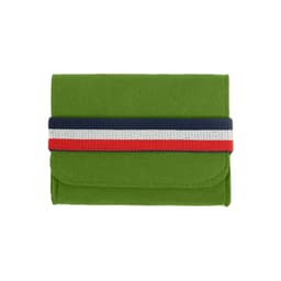 A green felt travel organizer with a striped fabric band in navy, red, and white across the front. It has a logo.