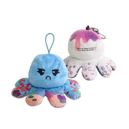A small reversible octopus plush toy featuring blue on one side, with an angry face, and white on the other with a playful design.