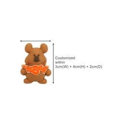 A brown bear-shaped shoe charm with orange "VIBES" text, measuring 3cm wide and 4cm high.