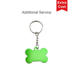A green bone-shaped pet ID tag on a silver keyring with a logo.