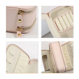 A pink PU leather jewellery case featuring a mirror, zip closure, and multiple compartments for organised storage.