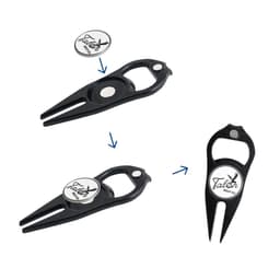 A black golf divot tool features a ball marker and a bottle opener, showcasing its multifunctional design.