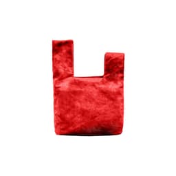 A red velvet wrist bag with a unique knot design and a substantial shape. Features a simple yet elegant appearance.