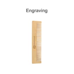 A fine-tooth bamboo comb in a natural light brown colour with a logo. Features engravings along the handle.