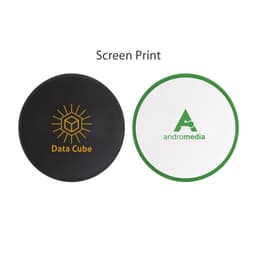 A foldable frisbee in black and white with green trim, featuring screen-printed logos.