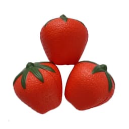 Three red strawberry-shaped stress relievers with green leaves on top, featuring a textured surface.