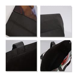 A tote bag in full colour with a black base and handles, featuring an interior pocket and textured finish.