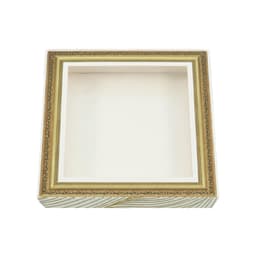 A square gift box with a decorative golden frame design, featuring a plain interior.