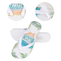 EVA thongs in white feature a tropical print with palm leaves and beach themes. Includes branding on the sole.