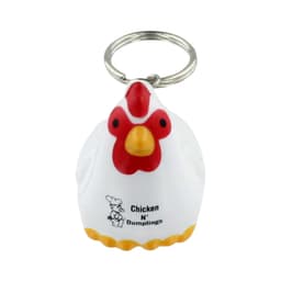A white chicken-shaped keyring with a red comb and beak, attached to a metal keyring.