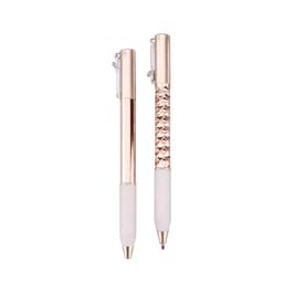 A set of two pens featuring rose gold and white designs, one with a smooth finish and the other with a textured grip.