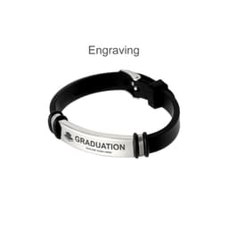 An engraved bracelet featuring a silver plate on a black band, designed for graduation commemorations.