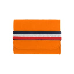 An orange felt travel organiser with a striped elastic band in navy, white, and red. It features a clasp closure.
