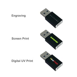 A collection of three USB drives in black, featuring different printing styles and designs. They all have branding on them.