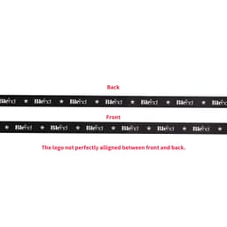 A ribbed fabric ribbon in black, displaying a repeated logo design on both sides with slight misalignment.